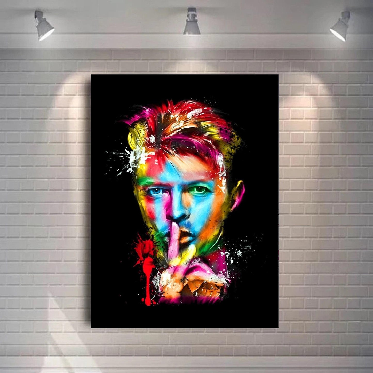 Colourful abstract pop art print of David Bowie, featuring vibrant splashes of paint on a black background. A striking Ziggy Stardust-inspired glam rock poster, perfect for music lovers and contemporary art enthusiasts. Ideal for canvas wall art or printed canvas decor.