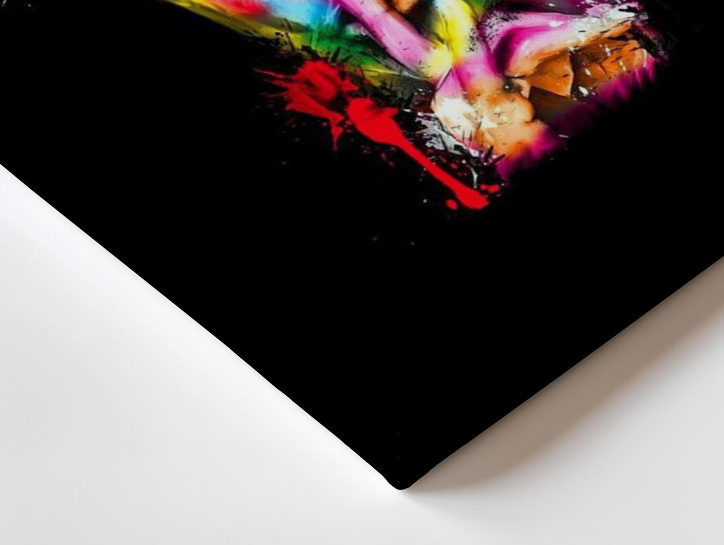 Colourful abstract pop art print of David Bowie, featuring vibrant splashes of paint on a black background. A striking Ziggy Stardust-inspired glam rock poster, perfect for music lovers and contemporary art enthusiasts. Ideal for canvas wall art or printed canvas decor.