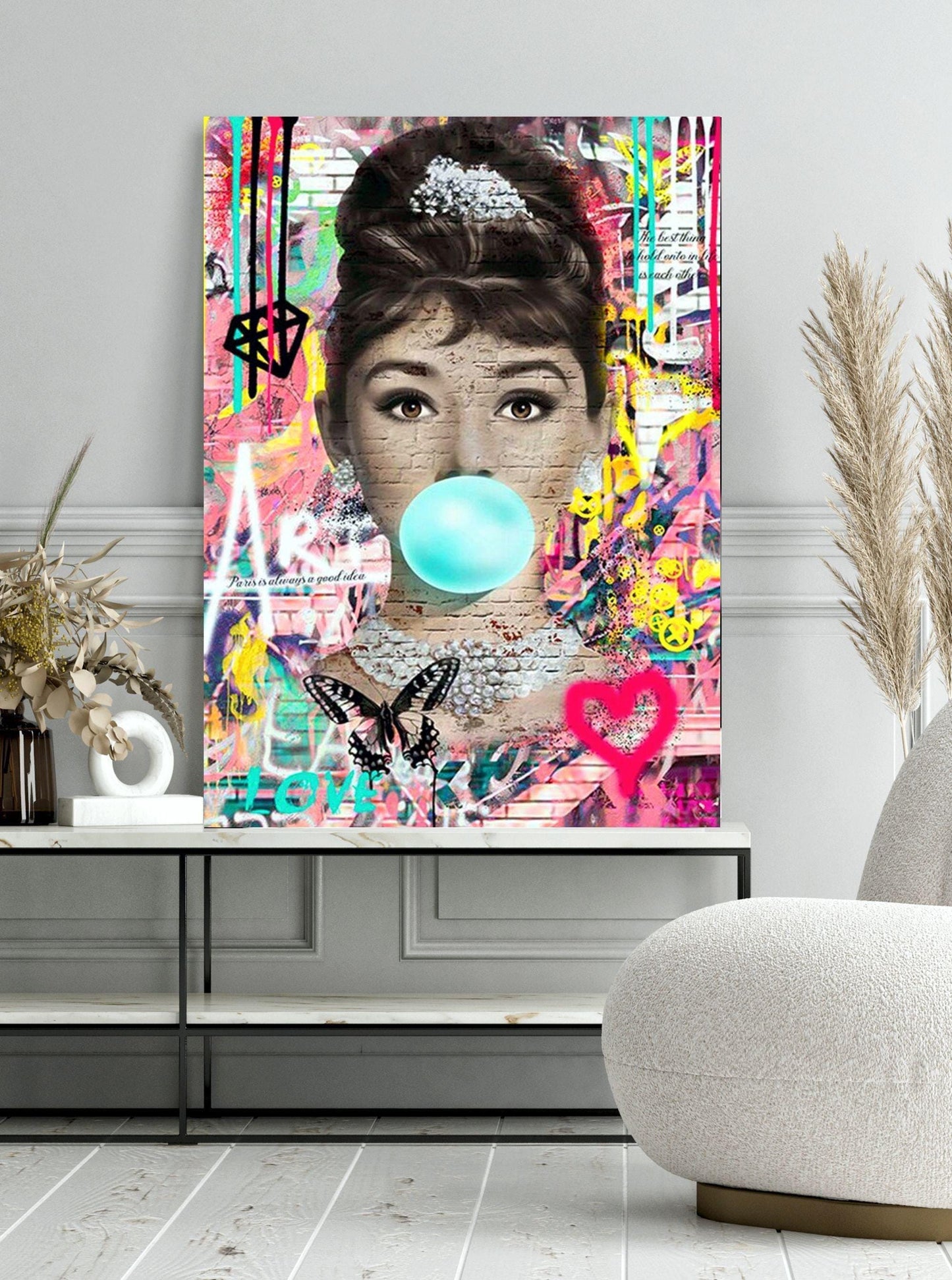 An iconic banksy style graffiti street art canvas of Audrey Hepburn. Also available as a poster print.