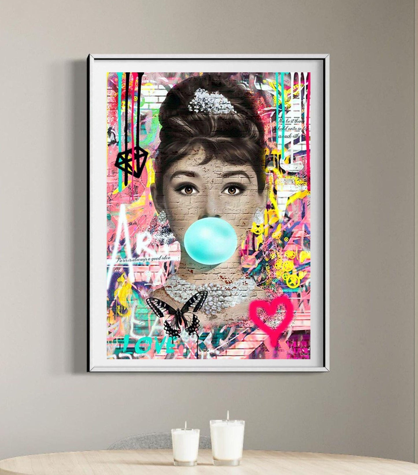 An iconic banksy style graffiti street art canvas of Audrey Hepburn. Also available as a poster print.