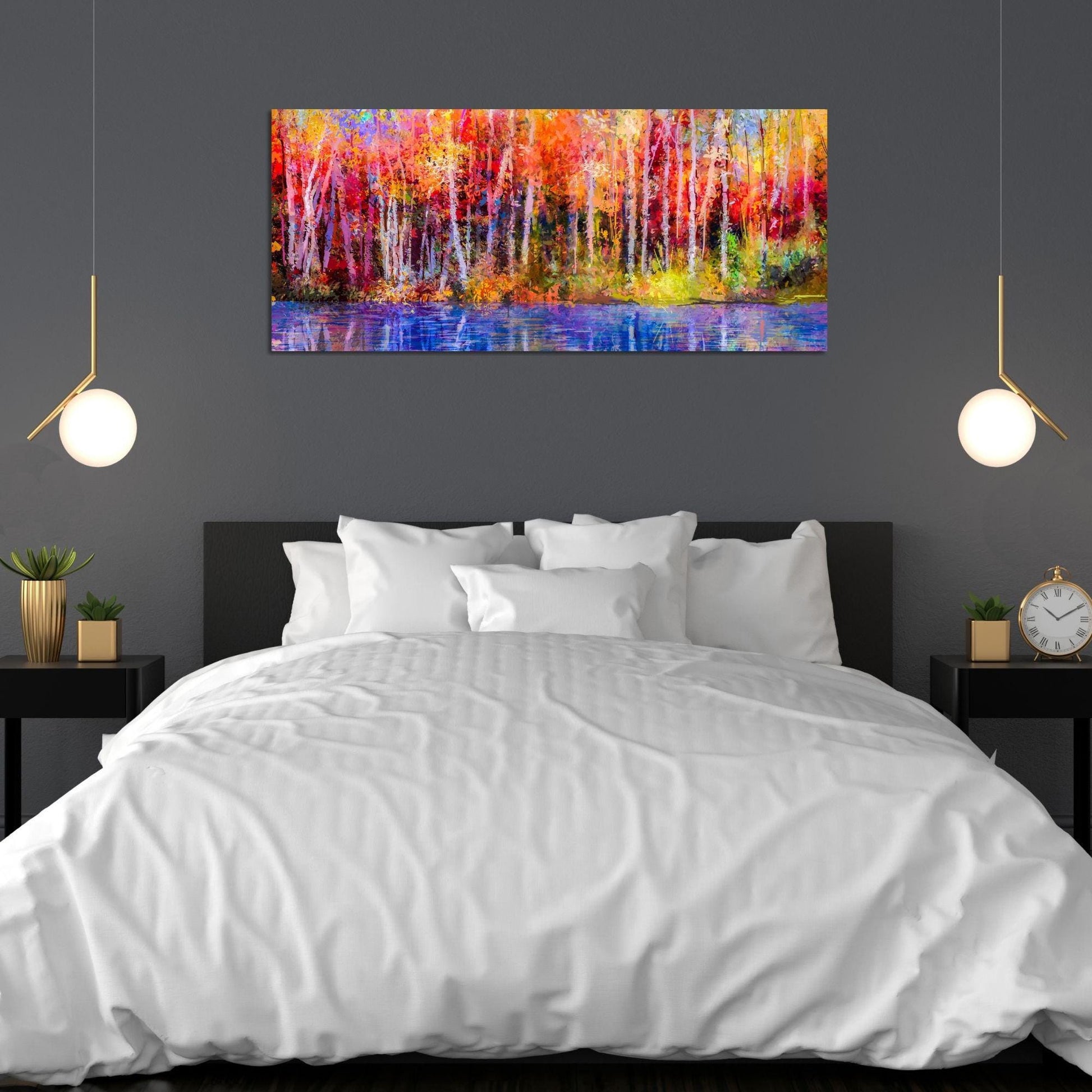 a large painting on a wall above a bed