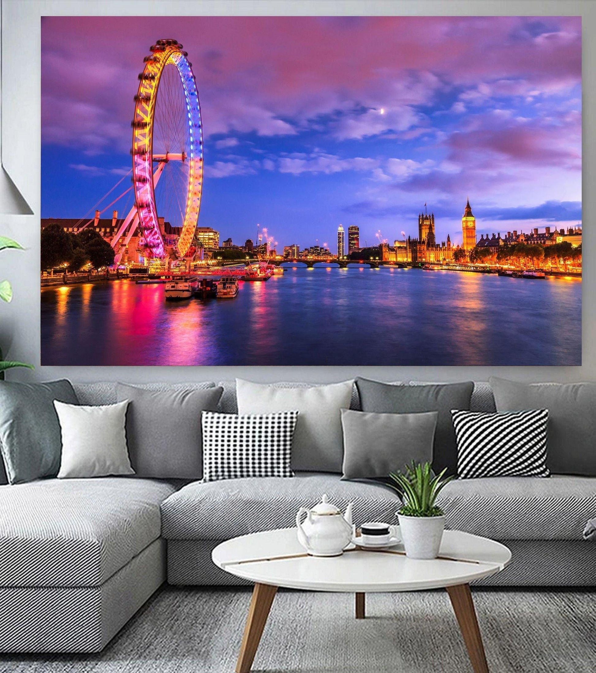 Colourful night time scene of London with London eye and Thames