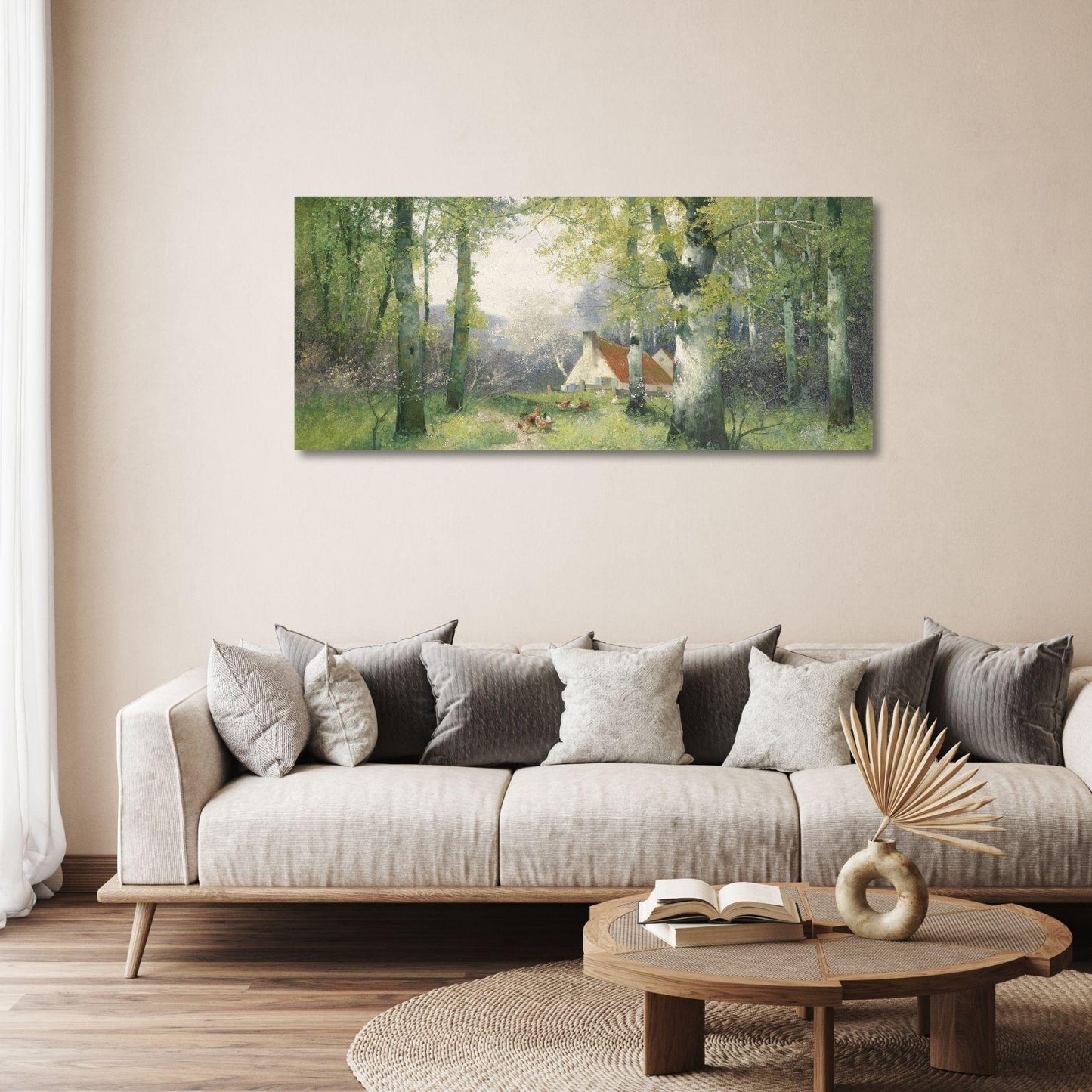 a living room with a couch and a painting on the wall