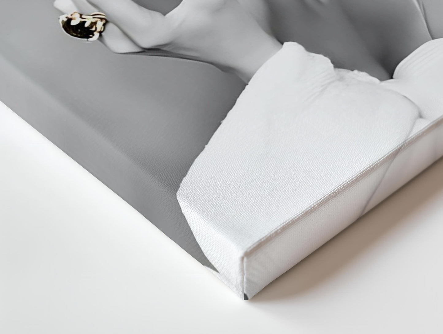 This elegant black-and-white portrait features Audrey Hepburn in a white robe and towel, wearing oversized sunglasses and gold earrings. Her lips and nails are highlighted in bold pink as she applies lipstick, adding a striking pop of colour. The vintage-inspired artwork exudes sophistication and luxury, capturing Hepburn’s timeless Hollywood glamour. A chic, fashion-forward print perfect for modern interiors and fans of iconic beauty.
