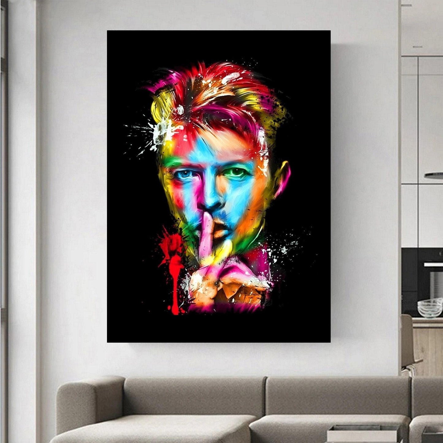 Colourful abstract pop art print of David Bowie, featuring vibrant splashes of paint on a black background. A striking Ziggy Stardust-inspired glam rock poster, perfect for music lovers and contemporary art enthusiasts. Ideal for canvas wall art or printed canvas decor.