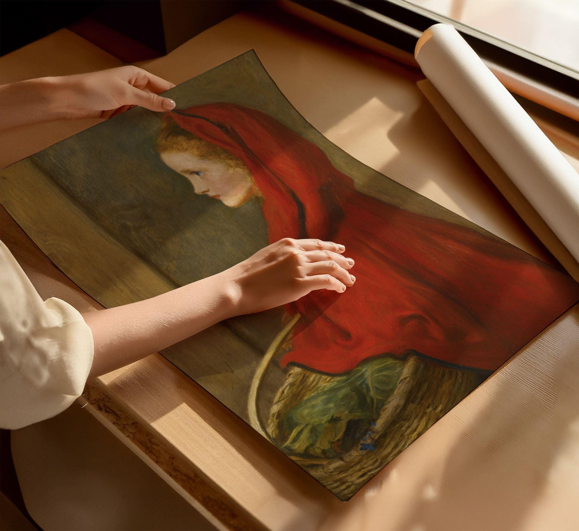 Unwrapping a poster Canvas wall art and poster of Millais Little Red Riding Hood oil painting by famous artist. The picture is appreciated by fine art lovers all over the world and bought as stretched canvases and poster prints.