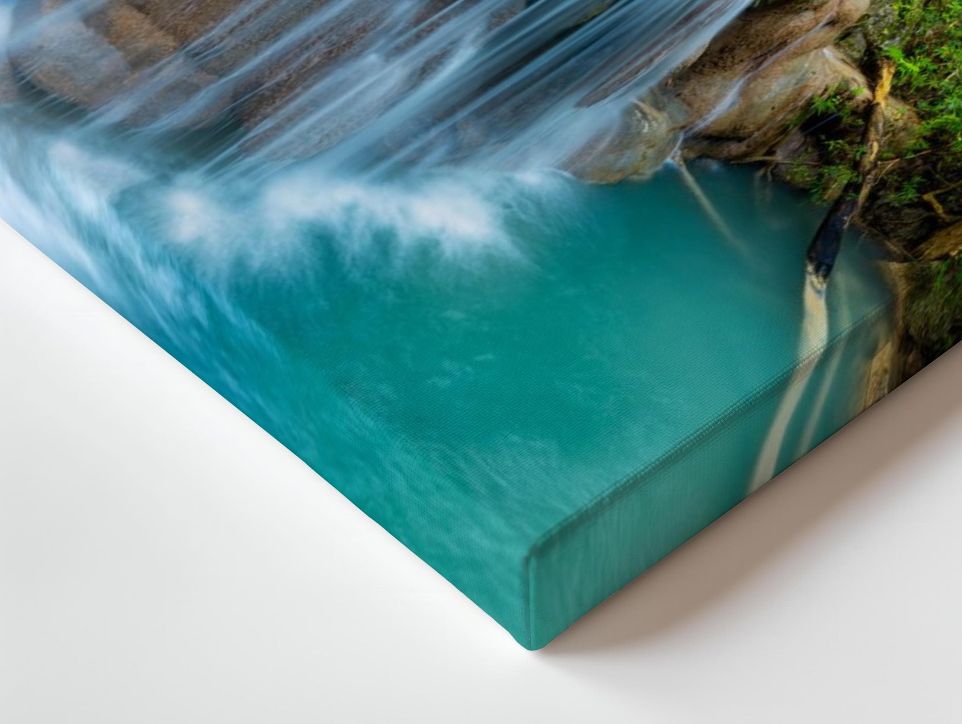 a picture of a waterfall in the middle of a body of water