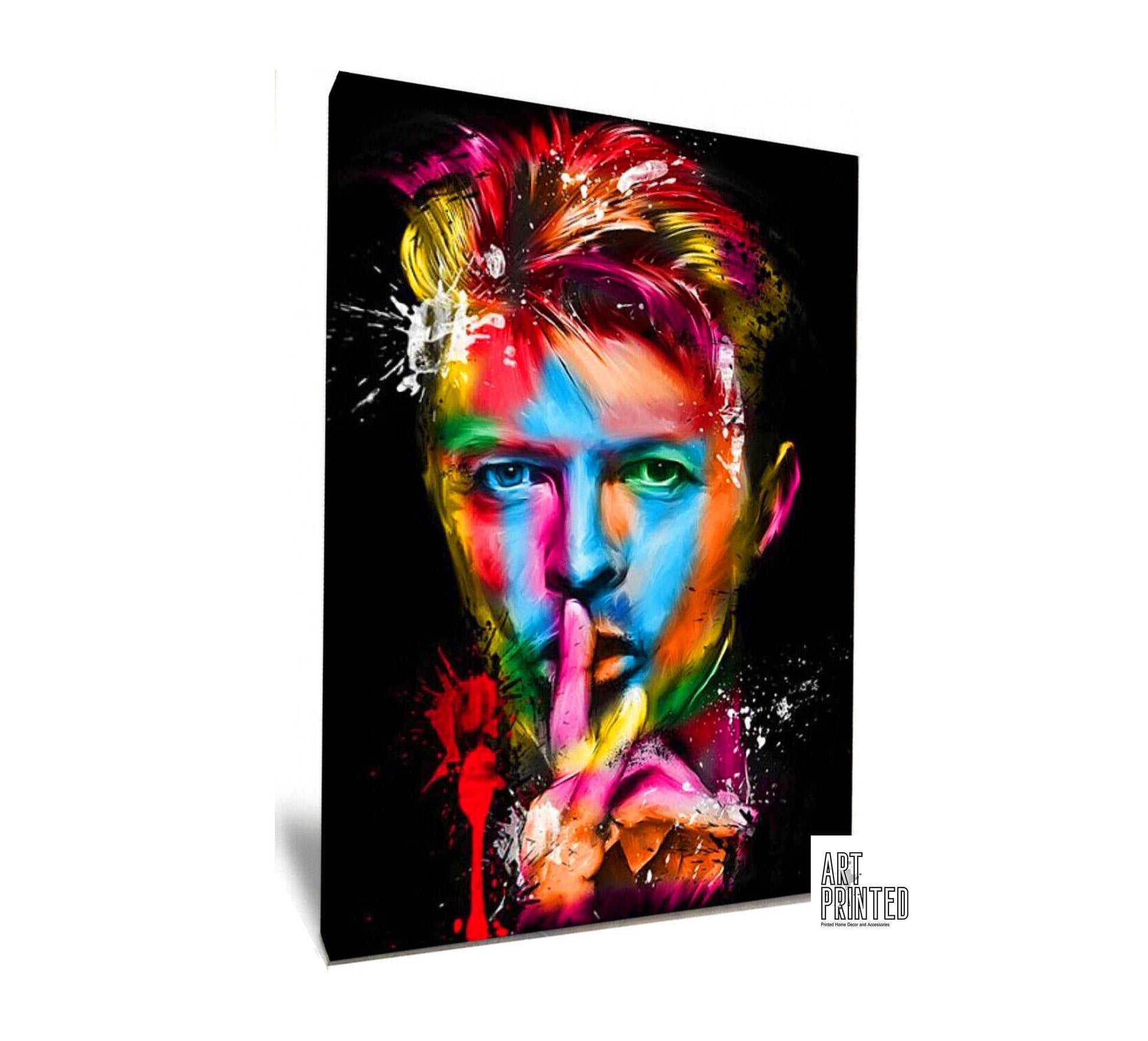 Colourful abstract pop art print of David Bowie, featuring vibrant splashes of paint on a black background. A striking Ziggy Stardust-inspired glam rock poster, perfect for music lovers and contemporary art enthusiasts. Ideal for canvas wall art or printed canvas decor.