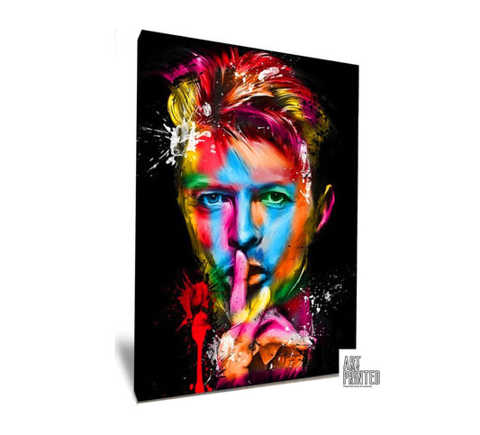 Colourful abstract pop art print of David Bowie, featuring vibrant splashes of paint on a black background. A striking Ziggy Stardust-inspired glam rock poster, perfect for music lovers and contemporary art enthusiasts. Ideal for canvas wall art or printed canvas decor.