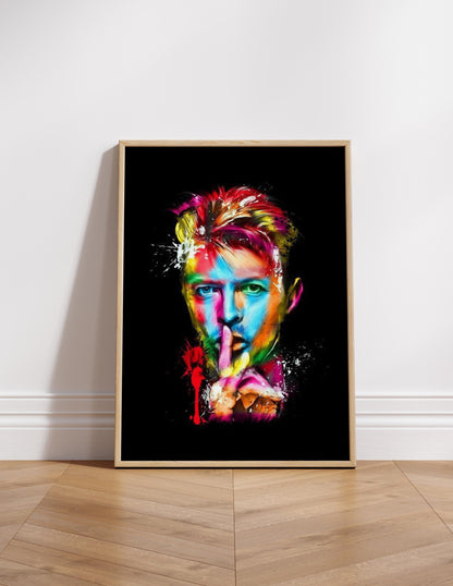 Colourful abstract pop art print of David Bowie, featuring vibrant splashes of paint on a black background. A striking Ziggy Stardust-inspired glam rock poster, perfect for music lovers and contemporary art enthusiasts. Ideal for canvas wall art or printed canvas decor.