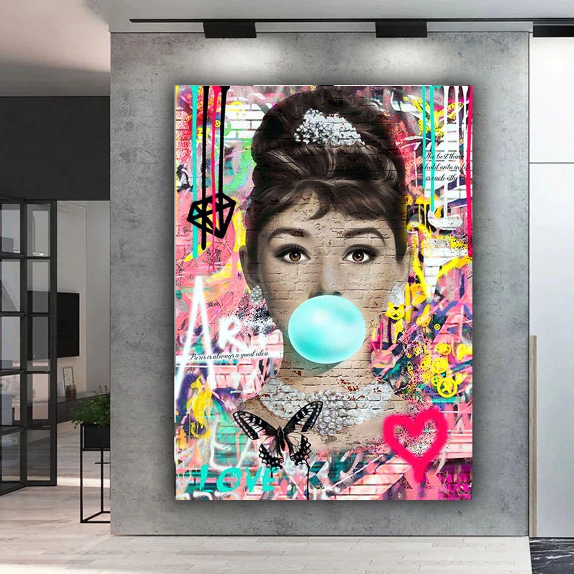 An iconic banksy style graffiti street art canvas of Audrey Hepburn. Also available as a poster print.