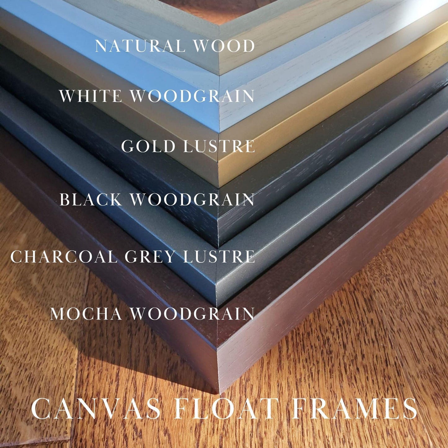 a collection of different colored wood grain frames, including natural wood, white woodgrain, gold lustre, black woodgrain, charcoal grey lustre, and mocha woodgrain, arranged in a stack. The frames are labeled with their respective colors, and the image also includes the text &quot;CANVAS FLOAT FRAMES&quot;.